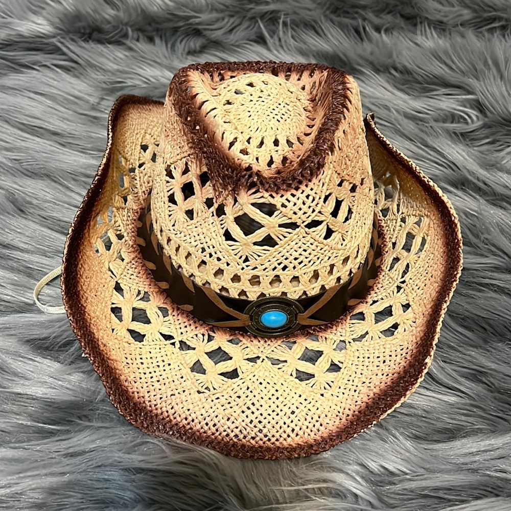 Tan straw cowboy hat